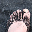 foot_in_black_sand